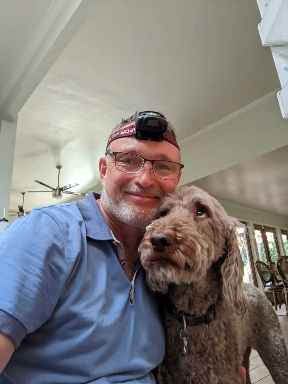 Vlad, owner of Phoenix Appliance Services, with a dog
